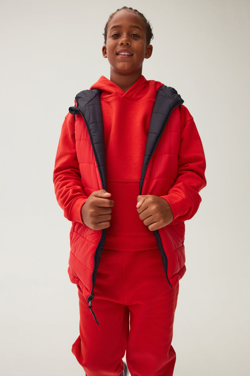 Boys red shop hooded vest