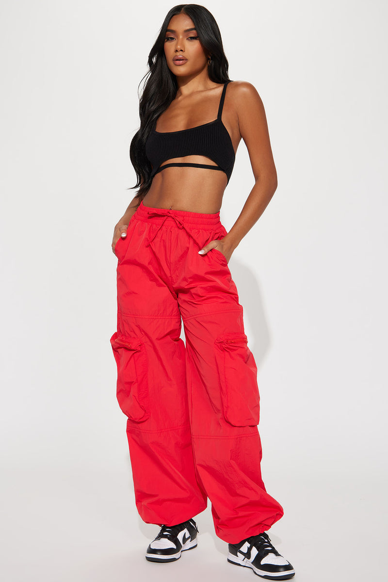 Jordan essential cargo parachute trousers in hibiscus red