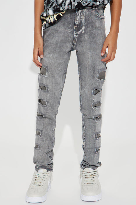 Medium High Rise Distressed Skinny Jeans — Hudson Square Boutique LLC