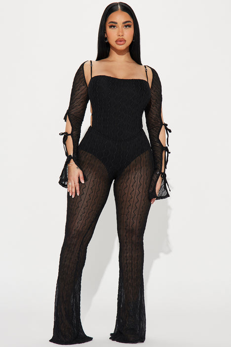 THE MESH JUMPSUIT JUST DROPPED.