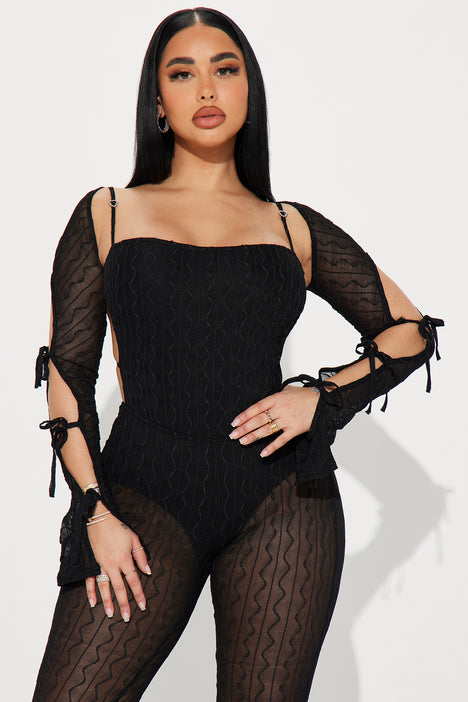 THE MESH JUMPSUIT JUST DROPPED.