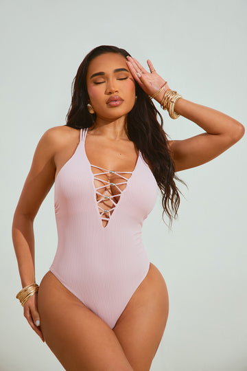 Fashion Nova is selling a VERY high cut tiger-print swimsuit and shoppers  say it looks like a 'painful front wedgie' – The Sun