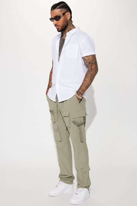 Stylish Man in White Button-down Shirt and White Cargo Pants