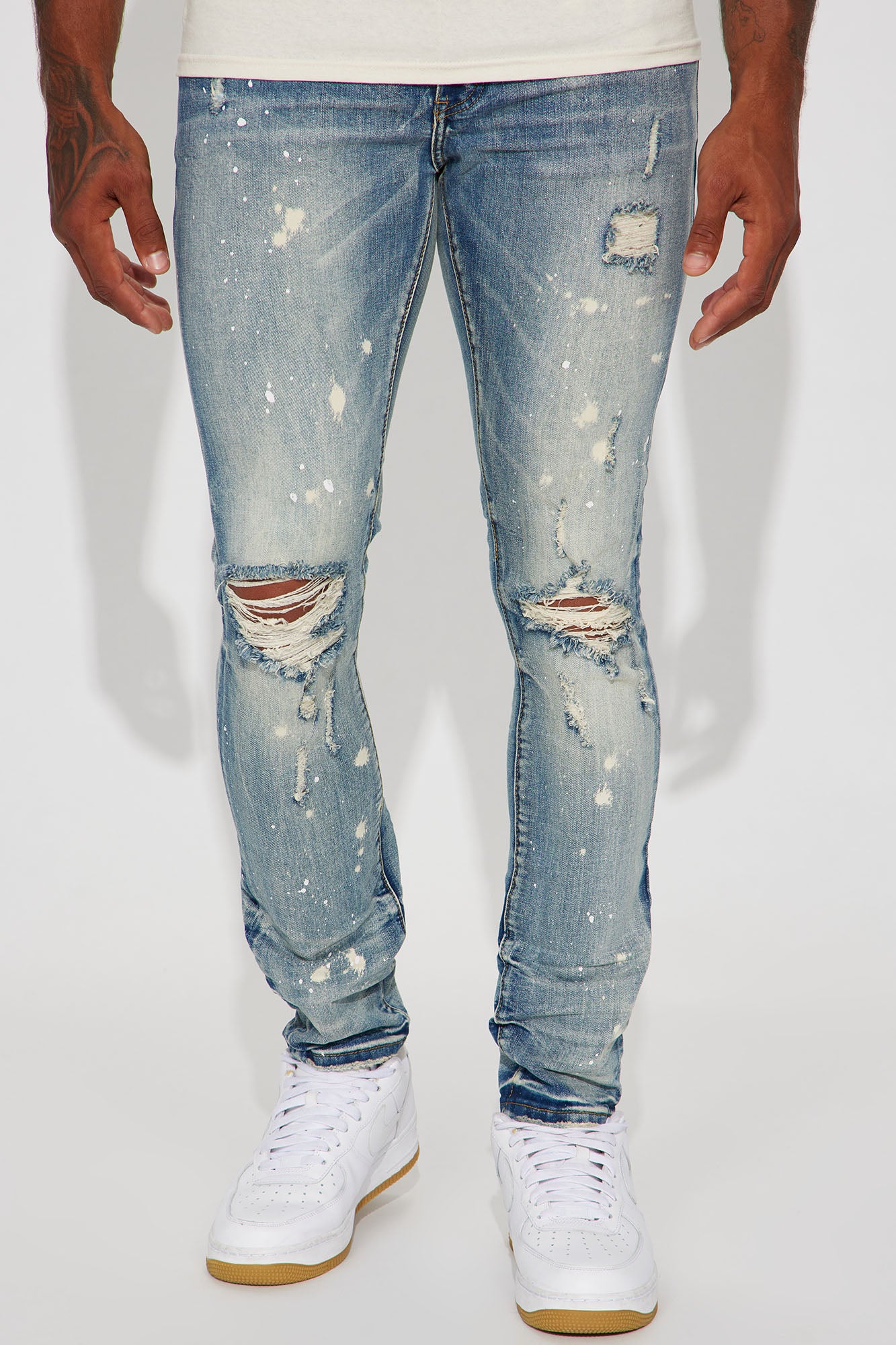 Bleach Spotted Ripped Knee Stacked Skinny Jeans - Light Wash