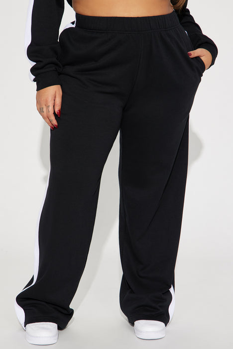 Buy Women Black Regular Fit Solid Wide Leg Drawstring Track Pants