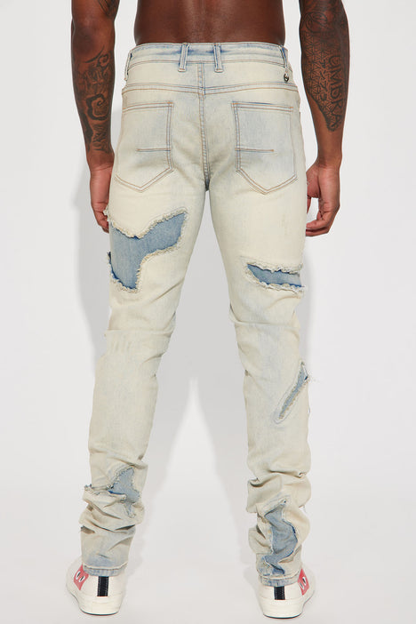 Bleach Spotted Ripped Knee Stacked Skinny Jeans - Light Wash