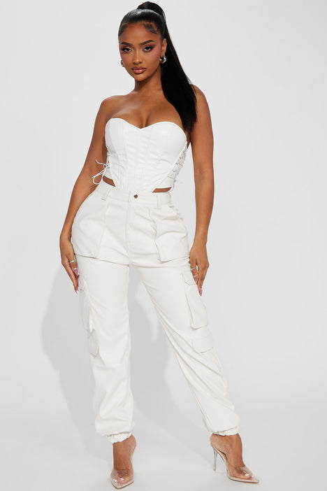 Blanc Chic 🤍⁠ 🔎 All The Details Faux Leather Corset Top⁠ 🔎 Weekender  Wide Leg Cargo Pant⁠