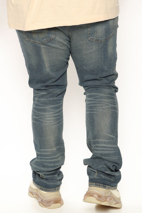Shredded Stacked Skinny Flared Jeans - Black Wash