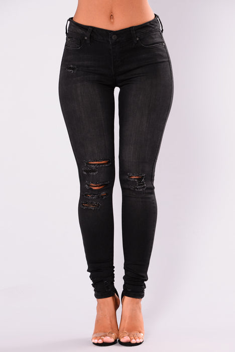 Black ripped skinny jeans best sale fashion nova